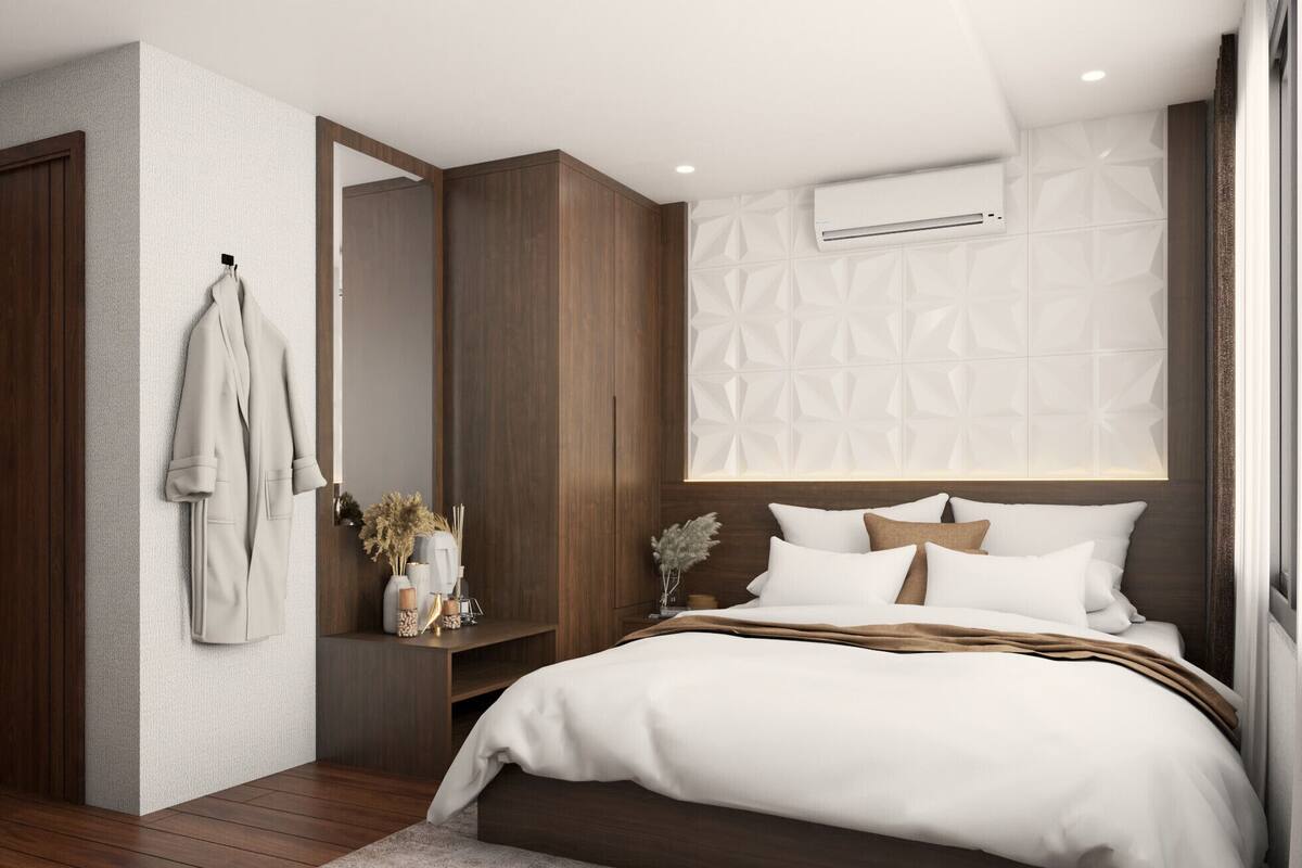 Een moderne slaapkamer met een groot bed, een houten garderobe en een ingebouwde airconditioning.