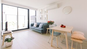 Departamento, 2 habitaciones | Área de sala de estar