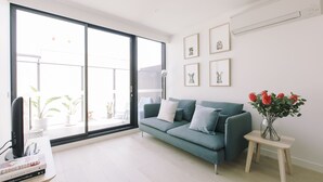 Departamento, 2 habitaciones | Área de sala de estar