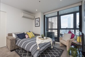 Modern 3 Bedroom Apartment Sutherland Street | Living area | Flat-screen TV - Modern 3 Bdr Apt Sutherland St (Melbourne)