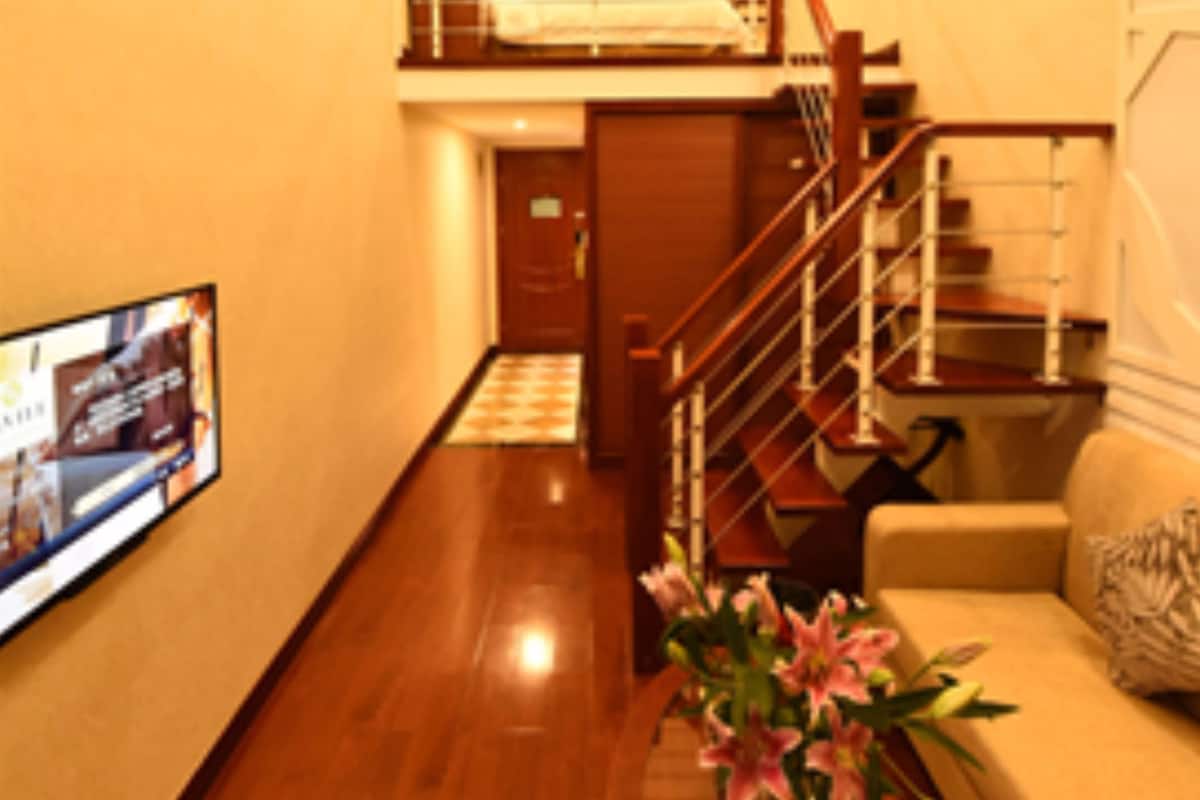 Duplex King Bed Room | Living area | LCD TV