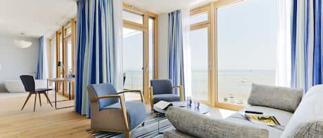 Suite, Sea View | Living area | Flat-screen TV