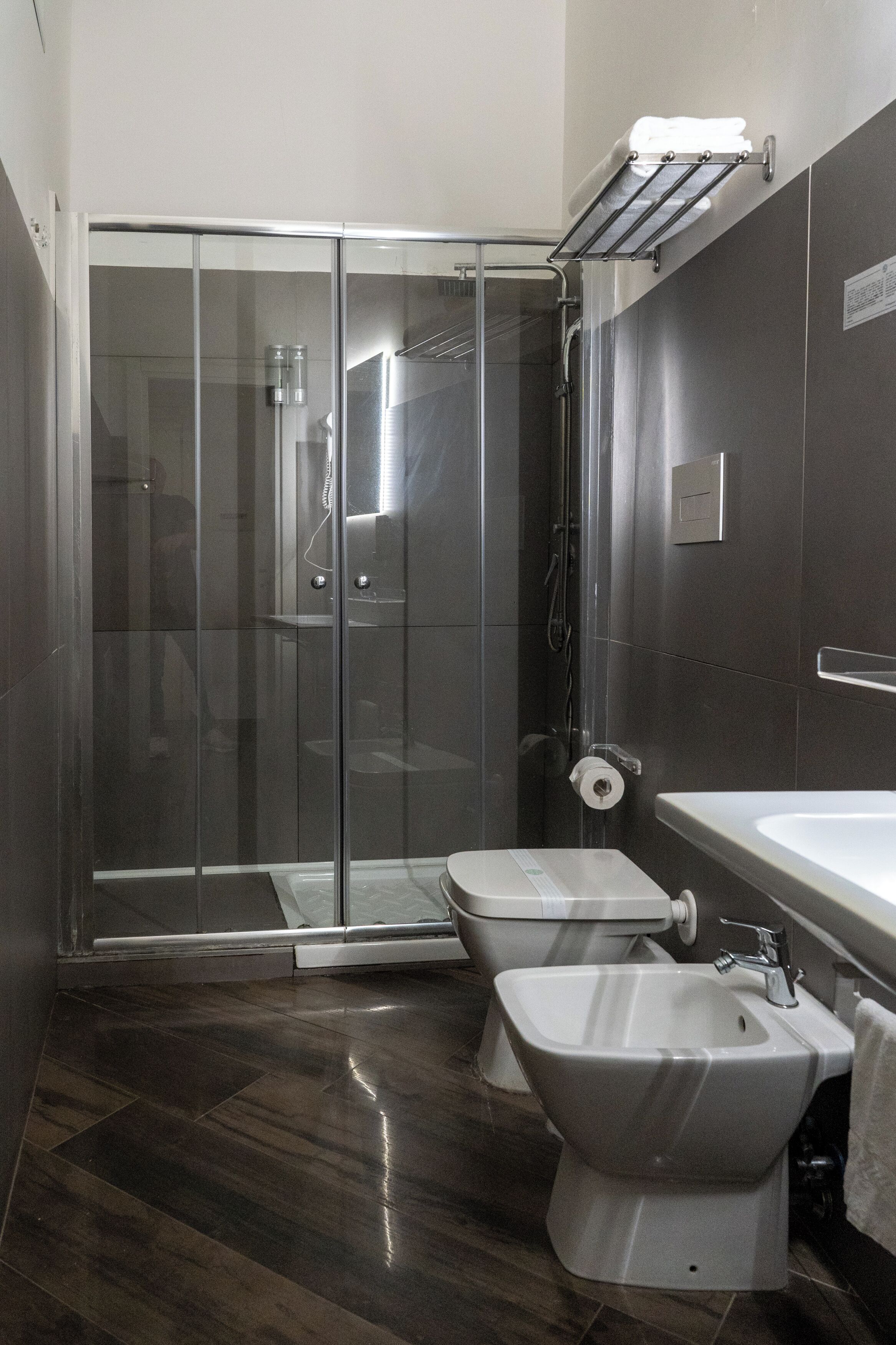 quadruple room | bathroom | shower, rainfall showerhead, free toiletries, hair dryer