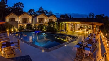 Outdoor pool, open 9:00 AM to 6:00 PM, pool umbrellas, pool loungers