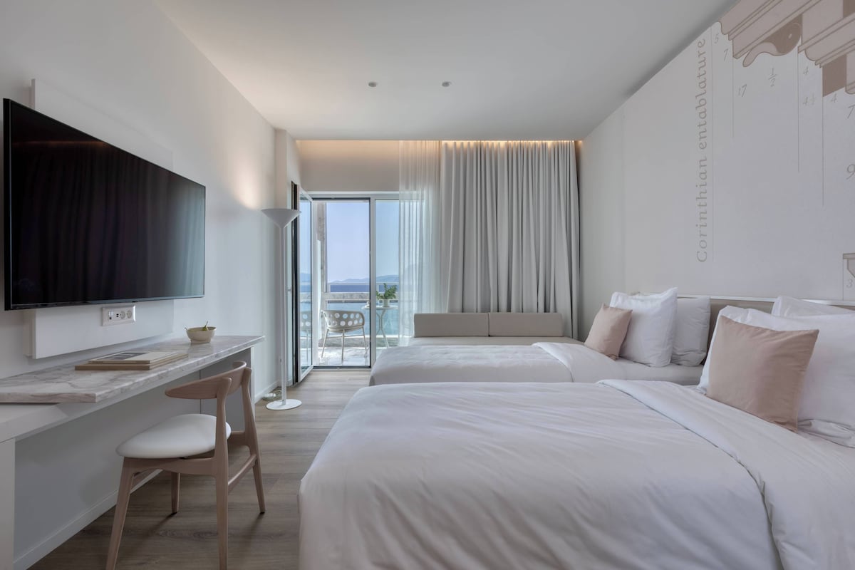 Superior Room, Multiple Beds, Balcony, Sea View | In-room safe, desk, soundproofing, WiFi (free)