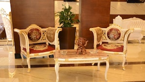 A luxurious lobby with ornate chairs and a marble coffee table. - Rojina Hotel (Amman)