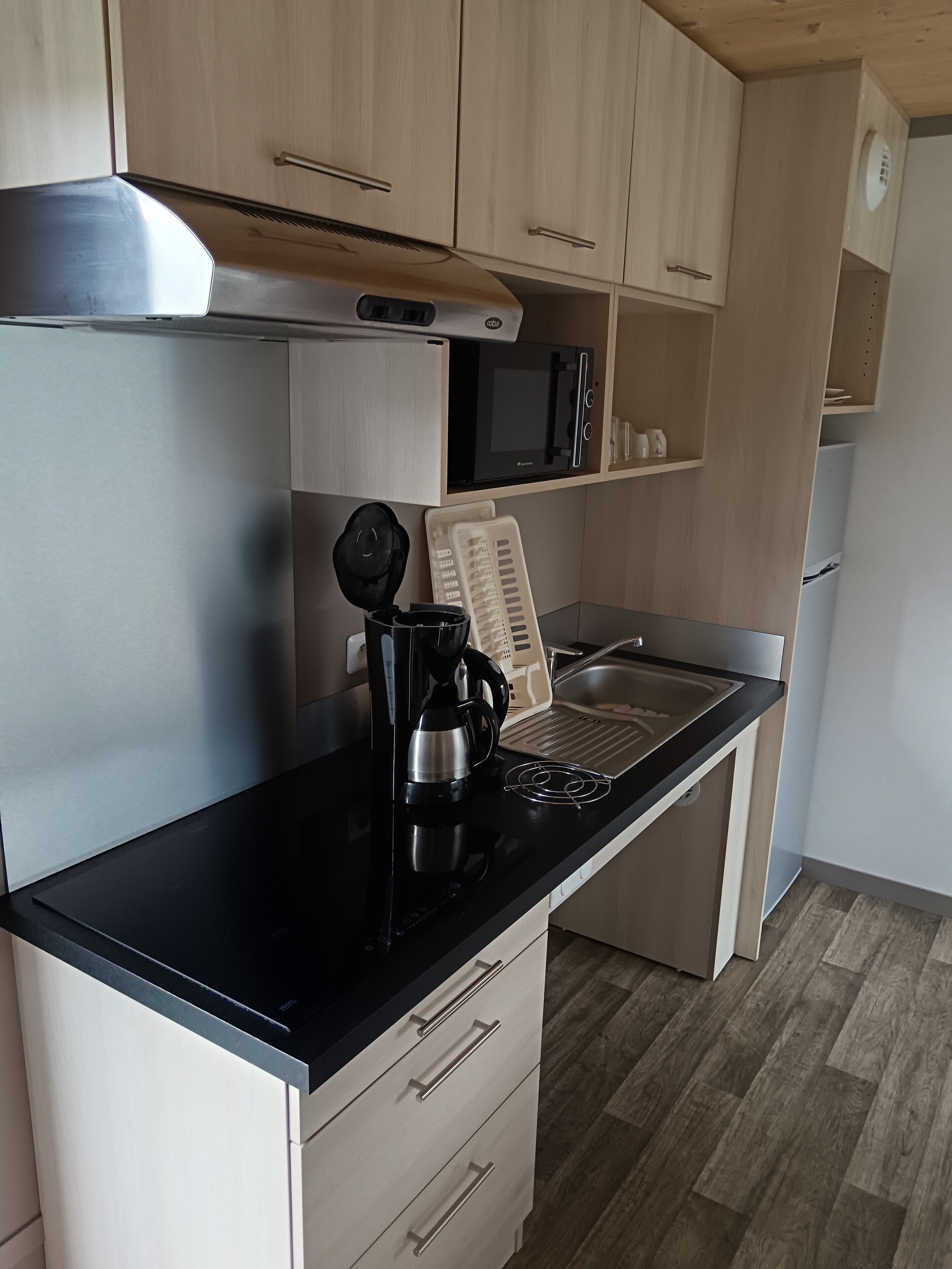 standard cottage, 2 bedrooms, mobility accessible | private kitchenette | fridge, microwave, stovetop, dishwasher