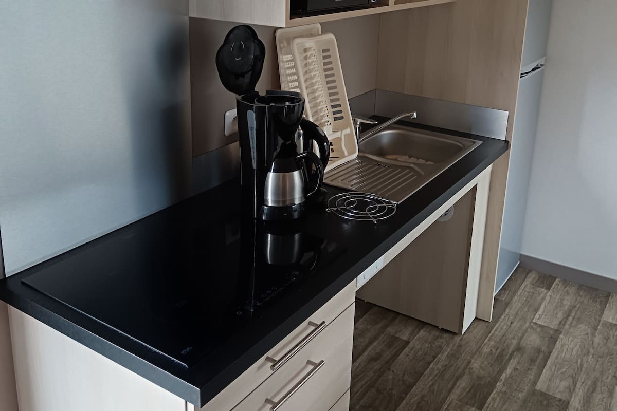 Standard Cottage, 2 Bedrooms, Mobility Accessible | Private kitchenette | Fridge, microwave, stovetop, dishwasher
