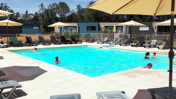 Outdoor pool, pool umbrellas, pool loungers