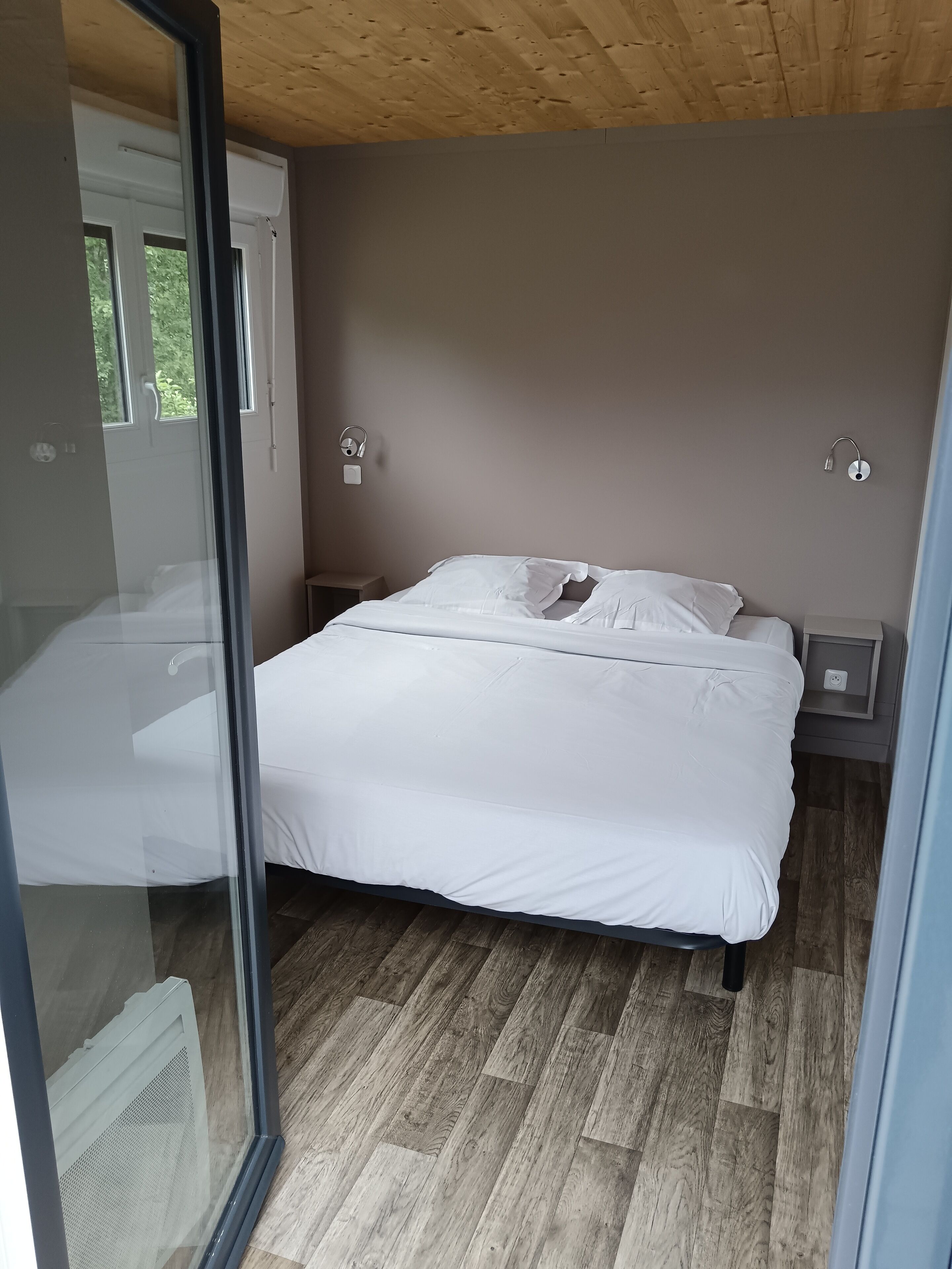 2 bedrooms, blackout curtains, soundproofing, iron/ironing board