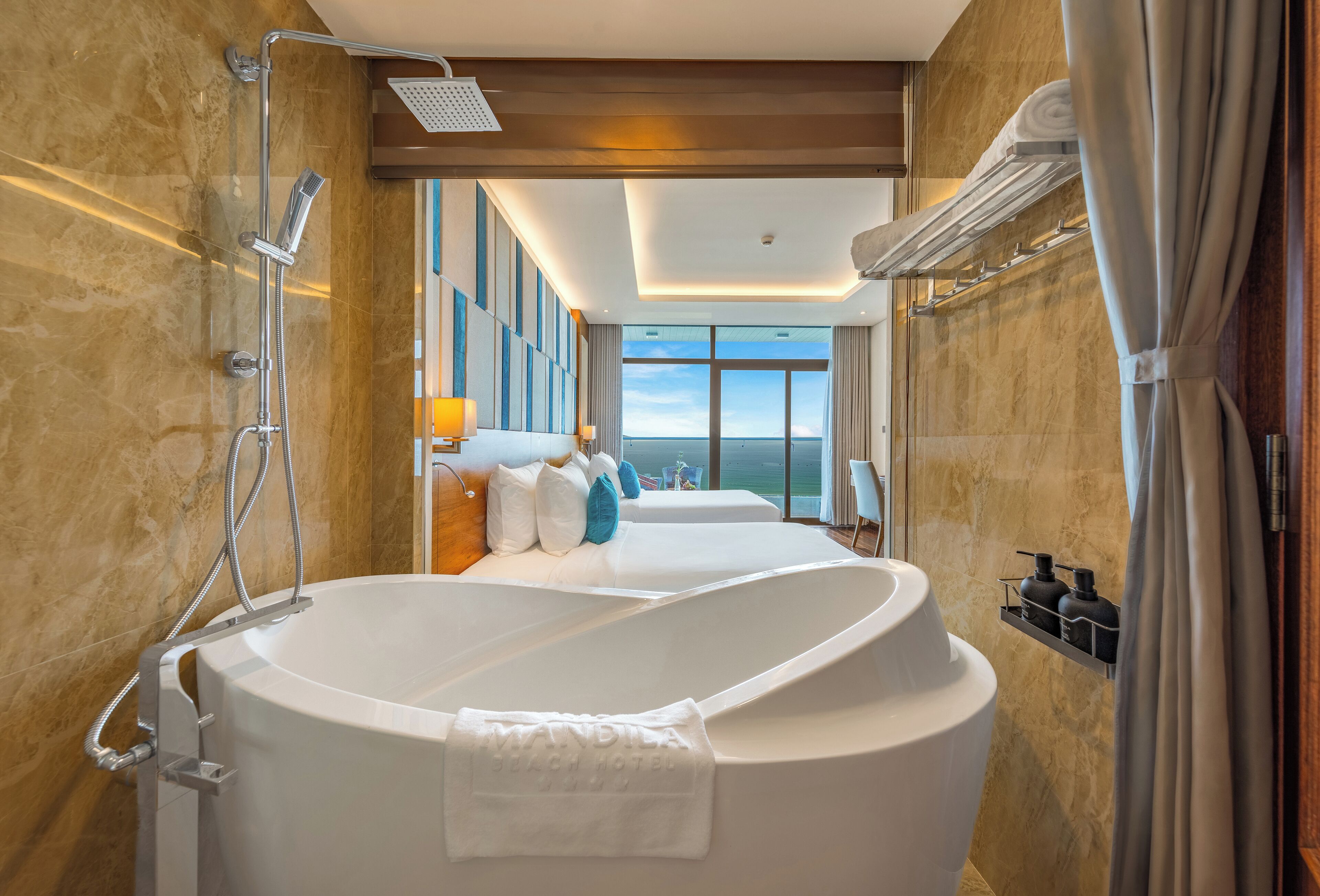 deluxe twin ocean front with balcony | bathroom | free toiletries, hair dryer, bathrobes, slippers