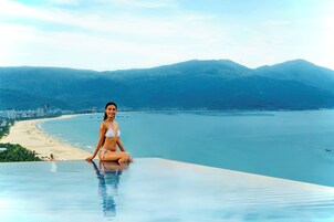 Outdoor pool, open 6:00 AM to 7:00 AM, pool umbrellas, sun loungers