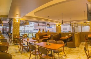 Breakfast, lunch, dinner served; local and international cuisine 