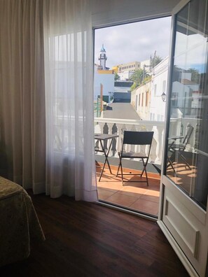 Desk, blackout drapes, iron/ironing board, free WiFi