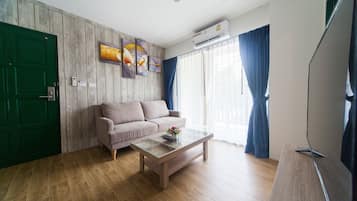 Family Suite | Living area | Flat-screen TV