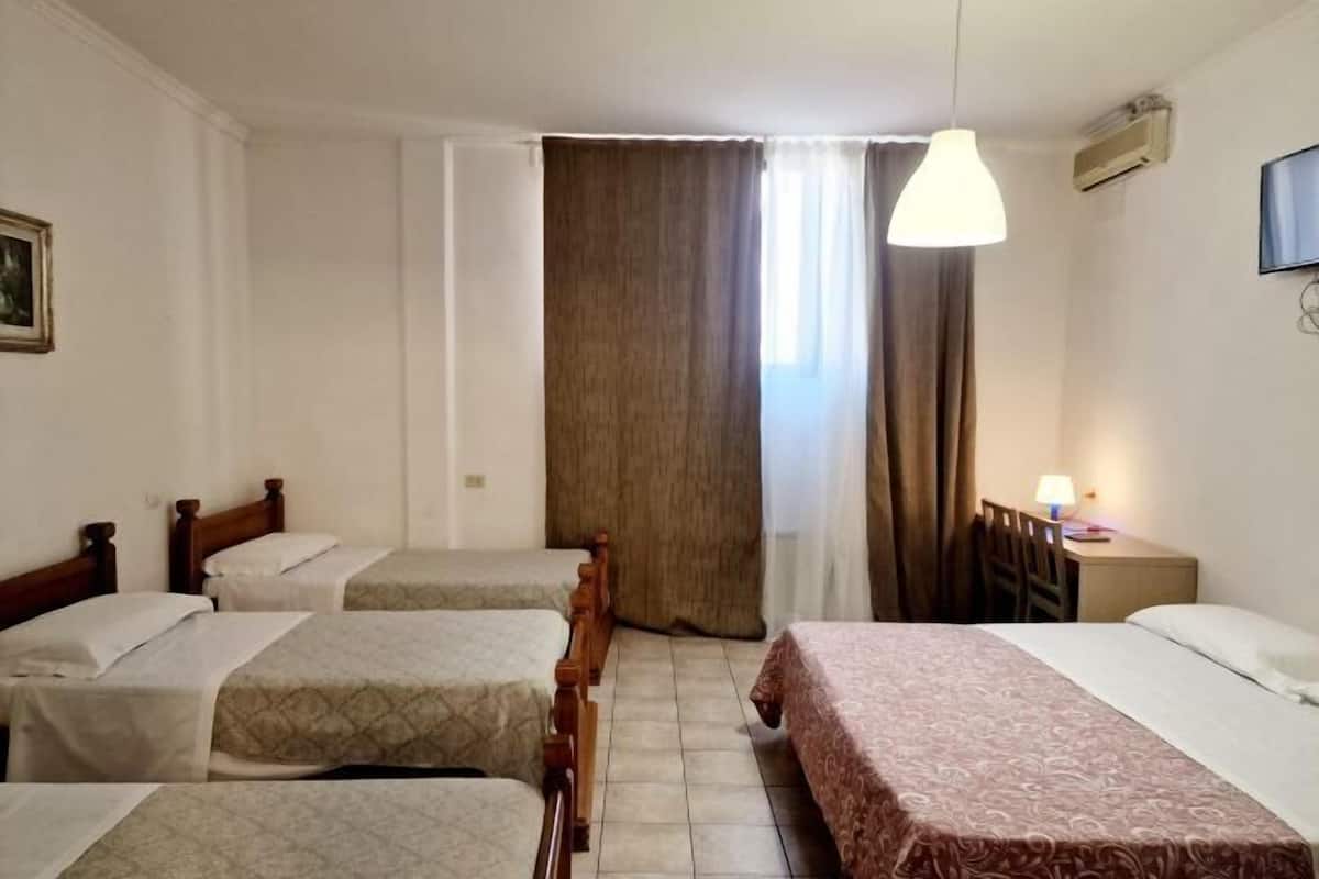 1 bedroom, desk, iron/ironing board, free rollaway beds