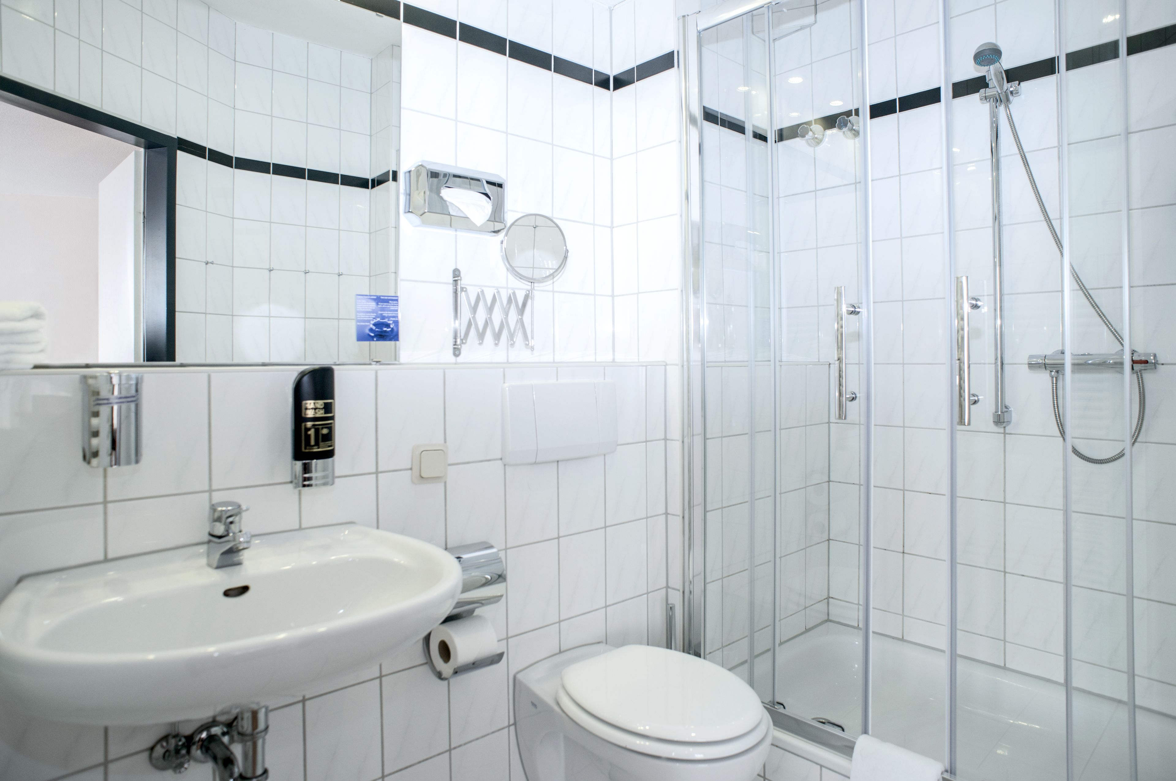 shower, free toiletries, hair dryer, towels