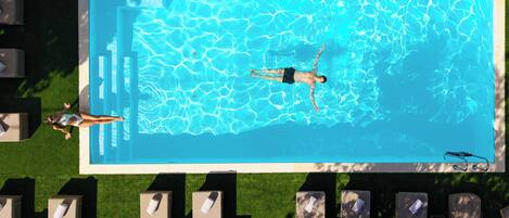 Seasonal outdoor pool, pool umbrellas, sun loungers