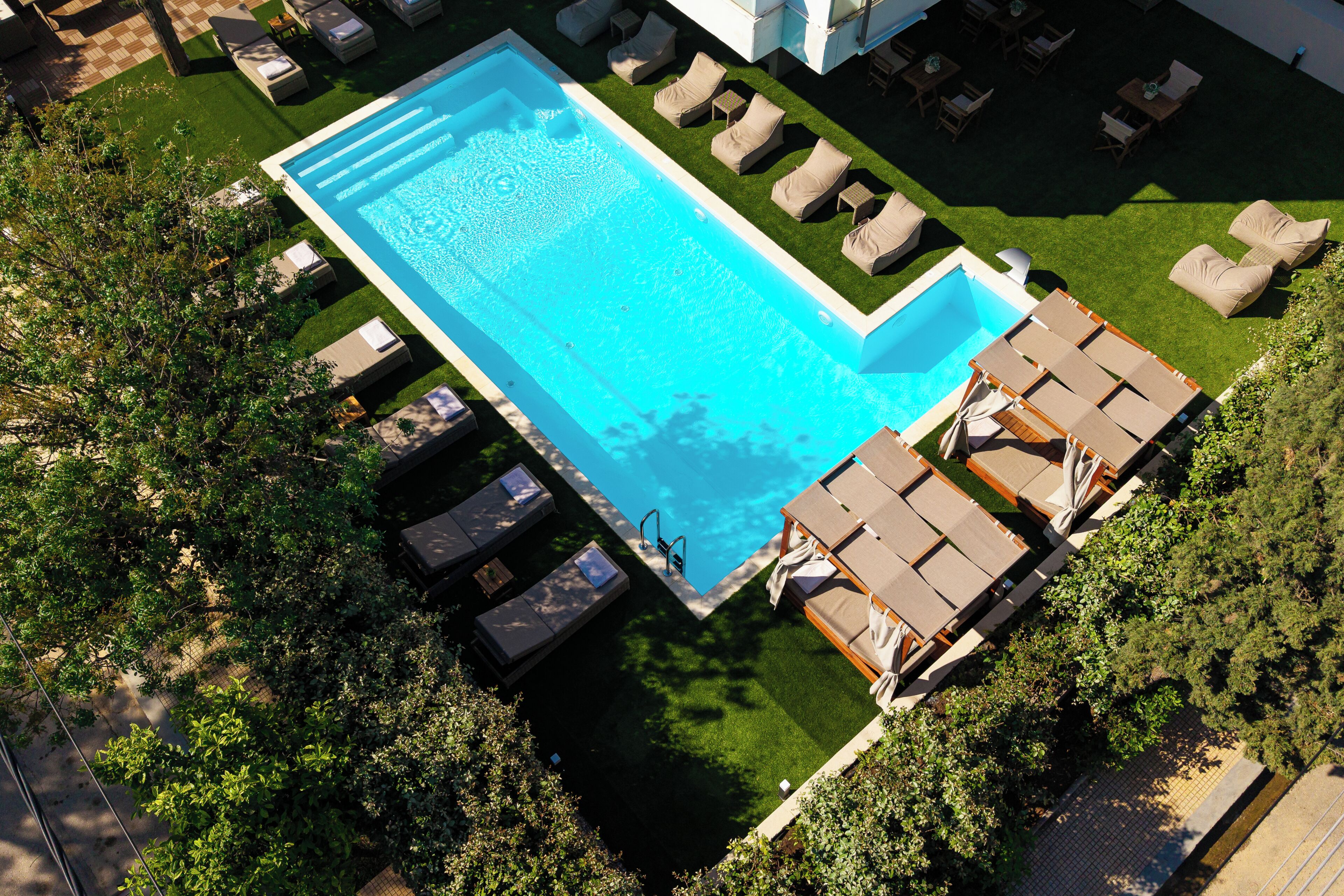 Seasonal outdoor pool, pool umbrellas, pool loungers