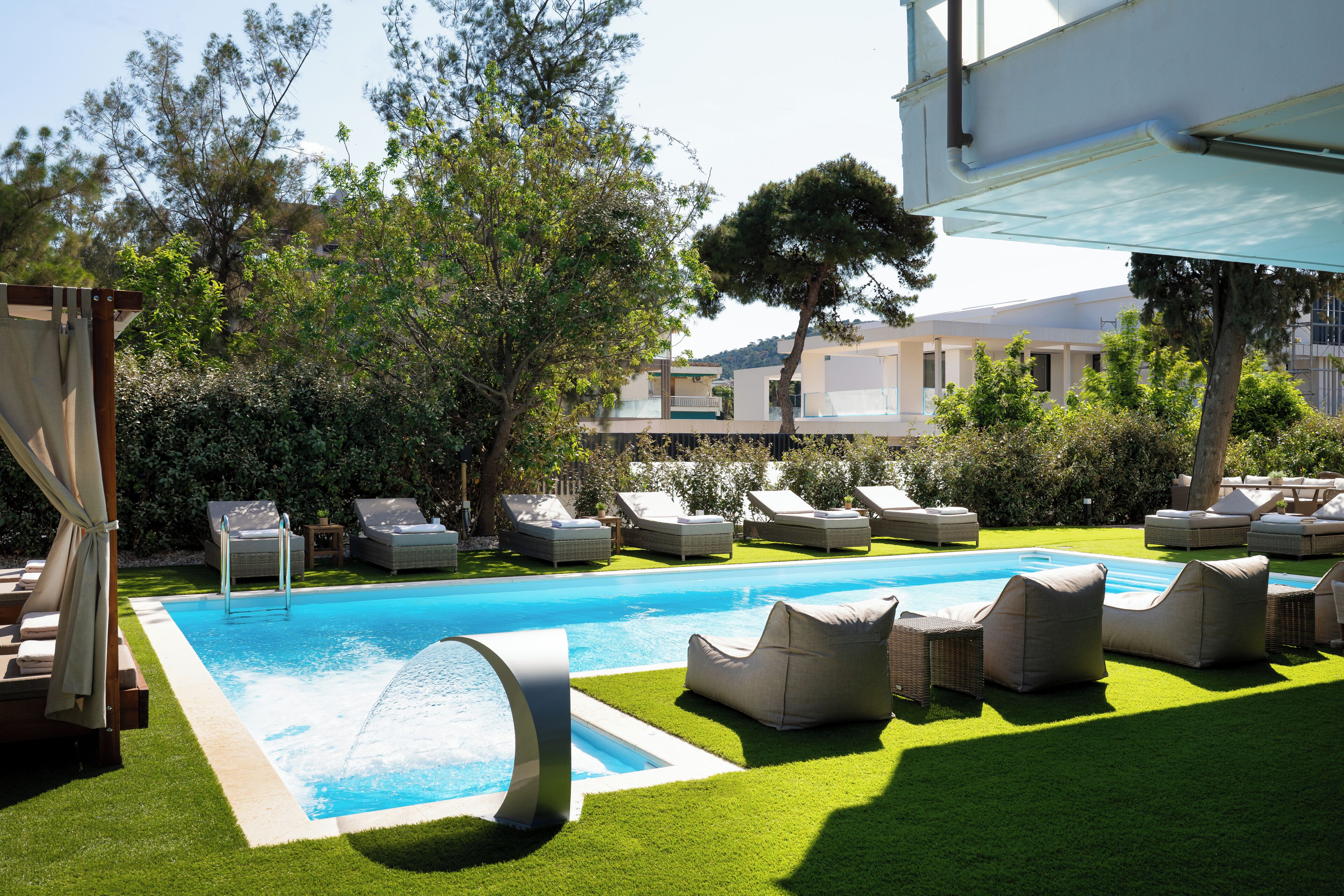 Seasonal outdoor pool, pool umbrellas, pool loungers