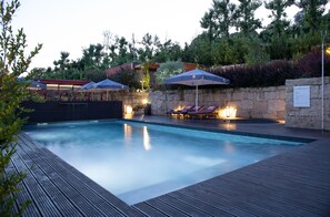 Indoor pool, seasonal outdoor pool, pool umbrellas, pool loungers