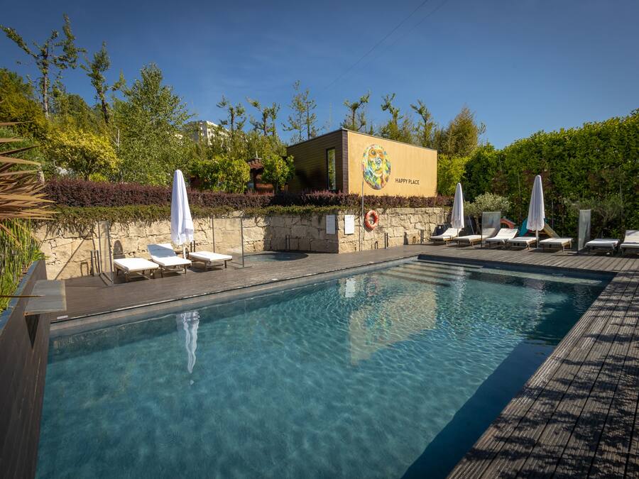 Indoor pool, seasonal outdoor pool, pool umbrellas, sun loungers
