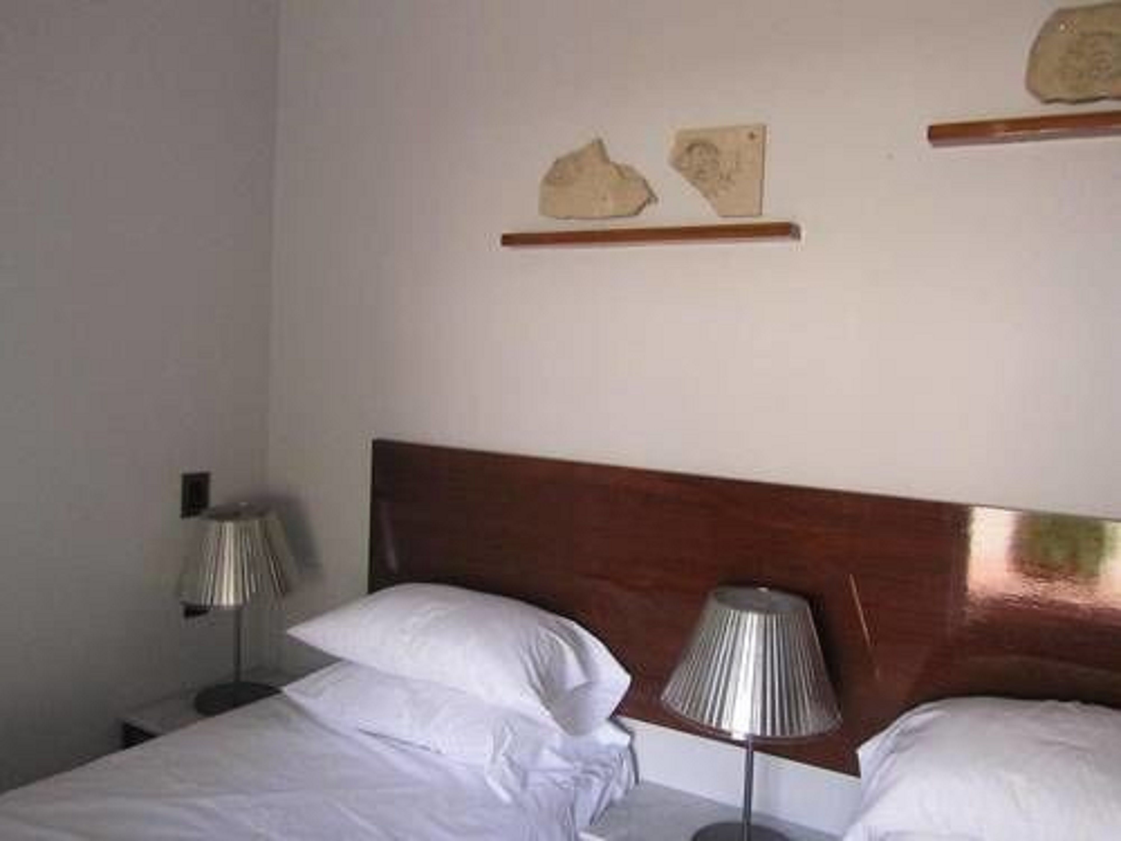 premium bedding, minibar, in-room safe, individually decorated