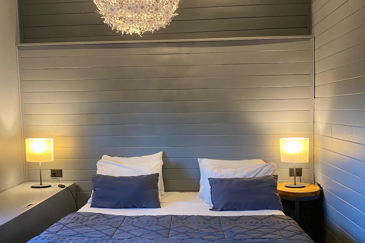 Quadrupla Executive, letti multipli, vista giardino | Biancheria da letto di alta qualità, minibar, una cassaforte in camera