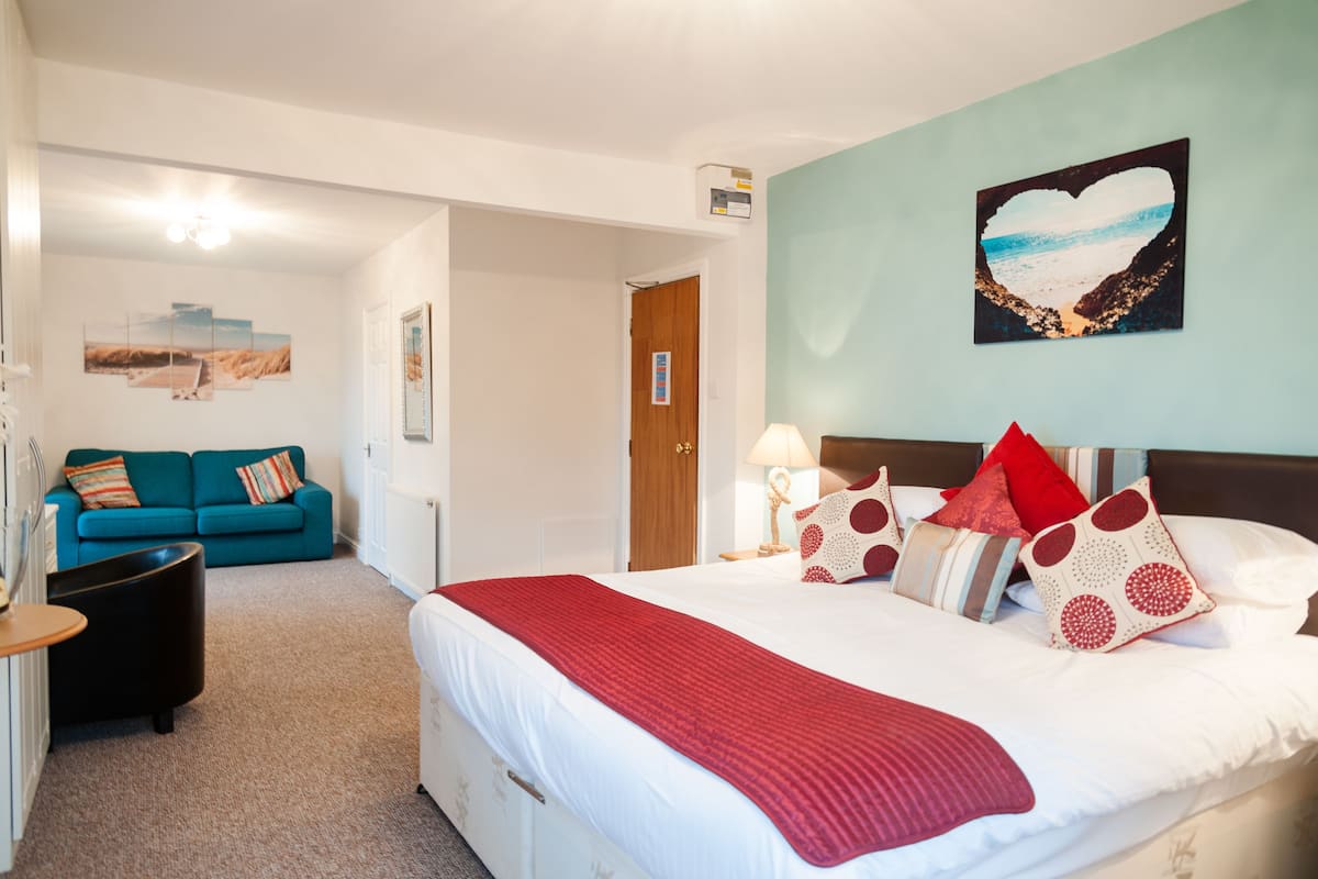 Suite, balkon, uitzicht op zee | Babybedden, gratis wifi
