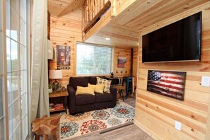 Rumah Pohon Eksklusif, 1 Tempat Tidur King dengan tempat tidur Sofa | Area keluarga | TV