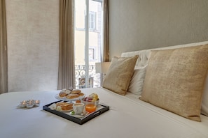 Frette Italian sheets, premium bedding, down comforters