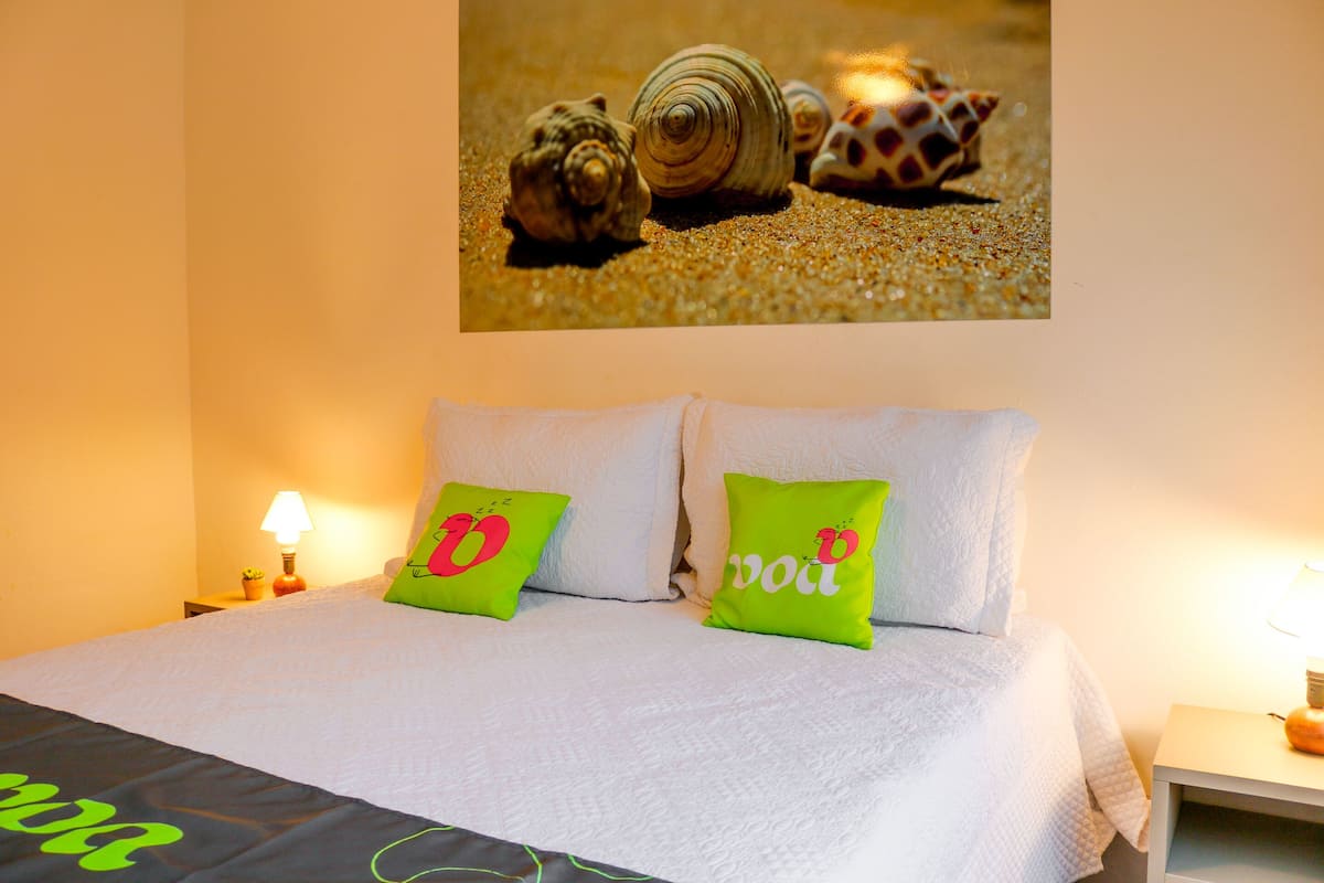 Standard Quadruple Room | Minibar, in-room safe, iron/ironing board, bed sheets