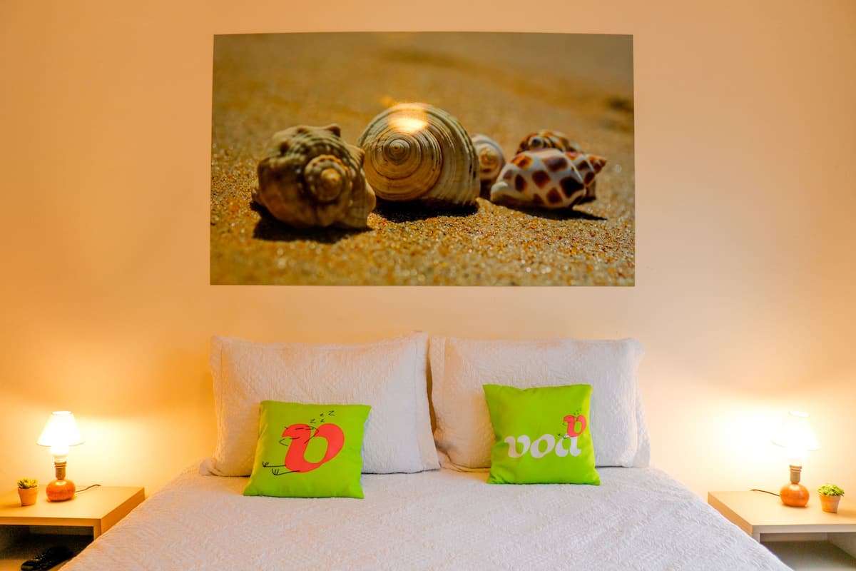 Standard Double Room | Minibar, in-room safe, iron/ironing board, bed sheets