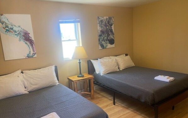 Classic Suite, 2 Double Beds, Kitchenette | Living area | 43-inch Smart TV with cable channels, TV