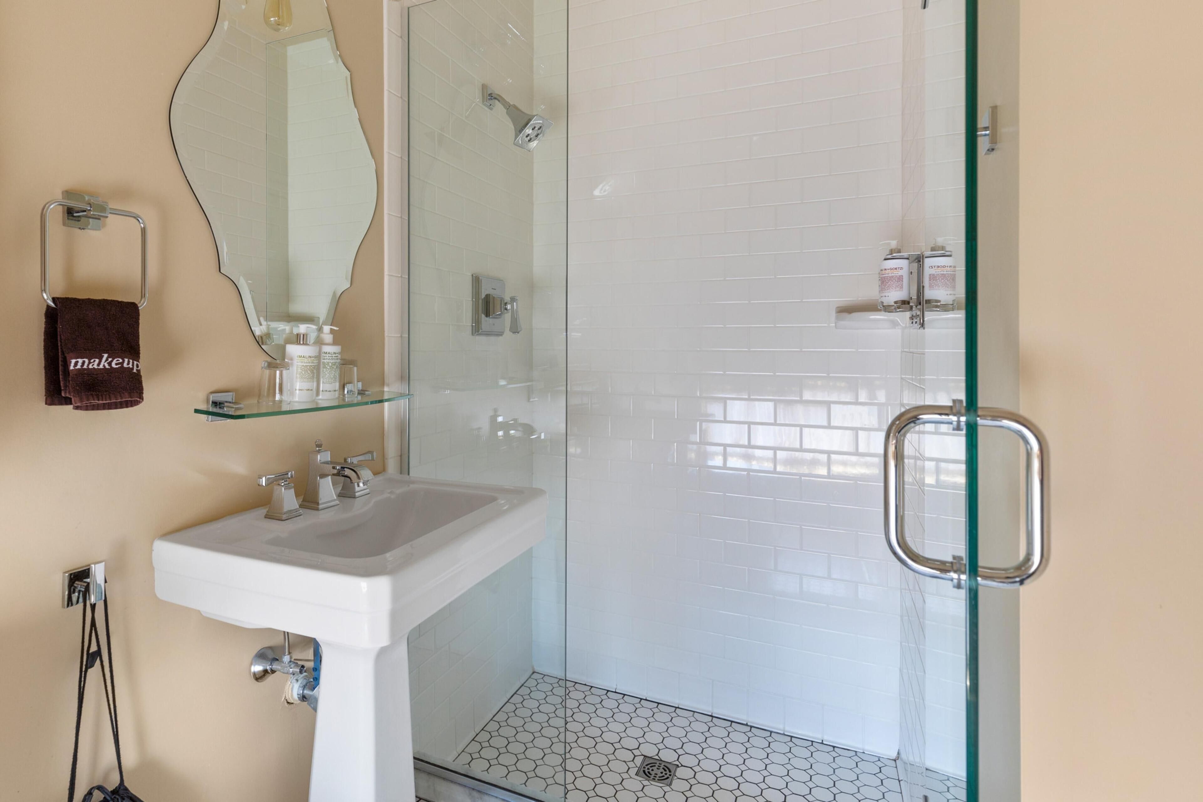 signature room, 1 queen bed | bathroom | shower, free toiletries, hair dryer, bathrobes