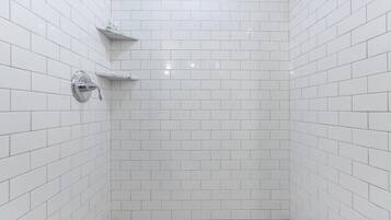 Carriage House | Bathroom | Hair dryer, towels