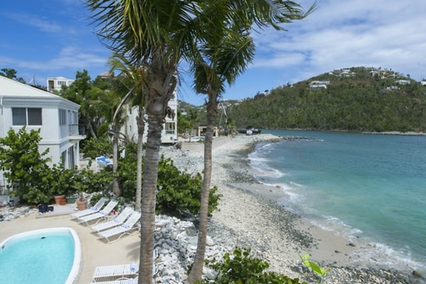 On the beach, sun loungers, beach towels, snorkeling