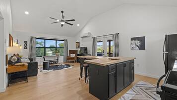 Premium Cabin | Living area | 52-inch Smart TV with digital channels, TV