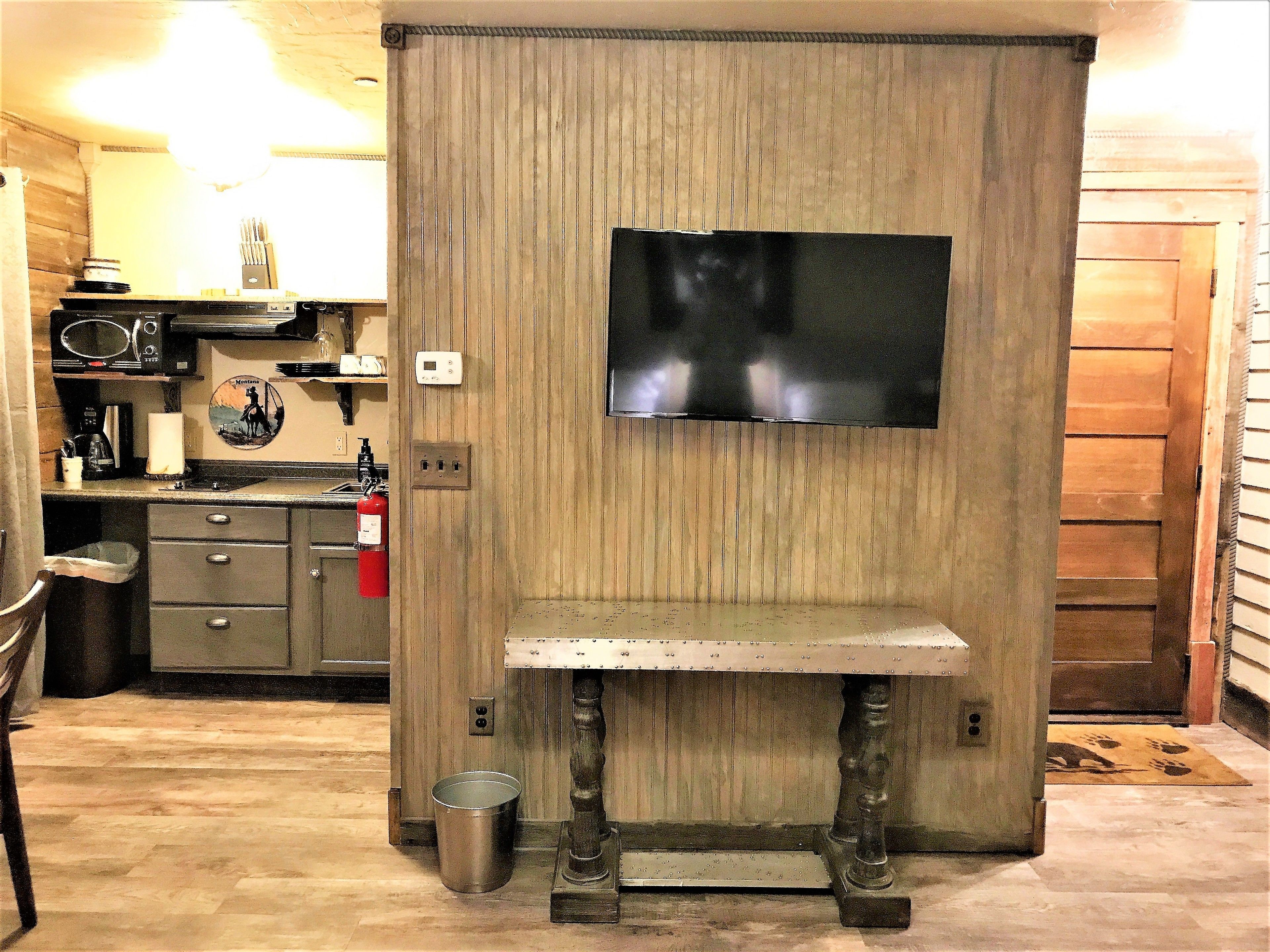 203 studio suite park mountain view | living area | 48-inch flat-screen tv with cable channels, tv