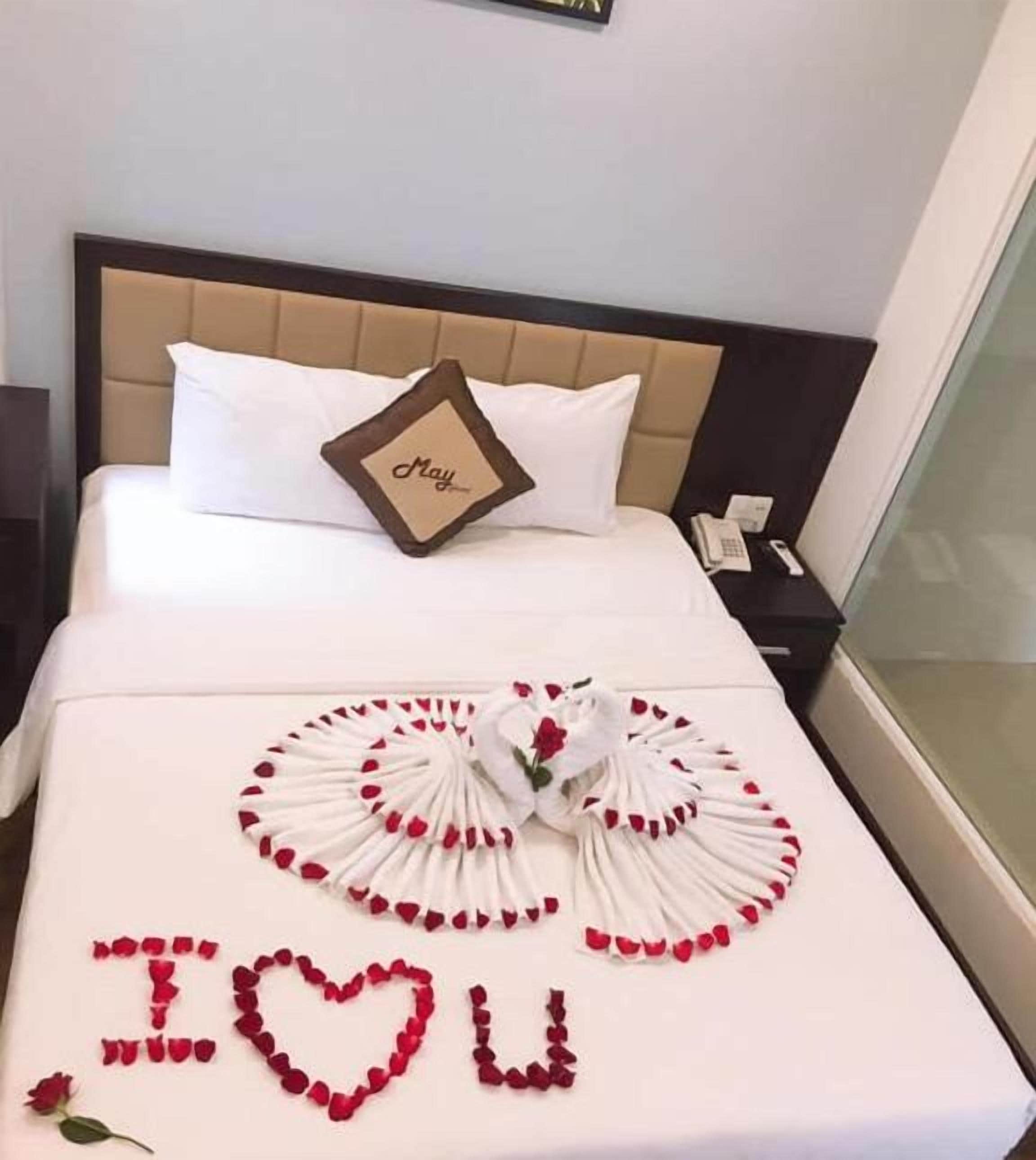 premium bedding, down duvets, memory-foam beds, minibar