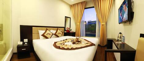 Premium bedding, down comforters, memory foam beds, minibar