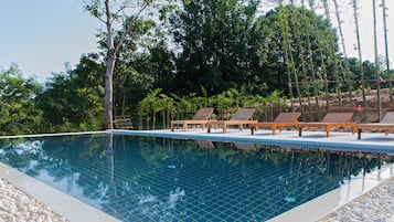 Outdoor pool, pool umbrellas, pool loungers