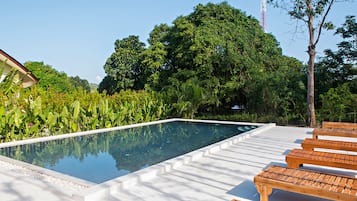 Outdoor pool, pool umbrellas, sun loungers