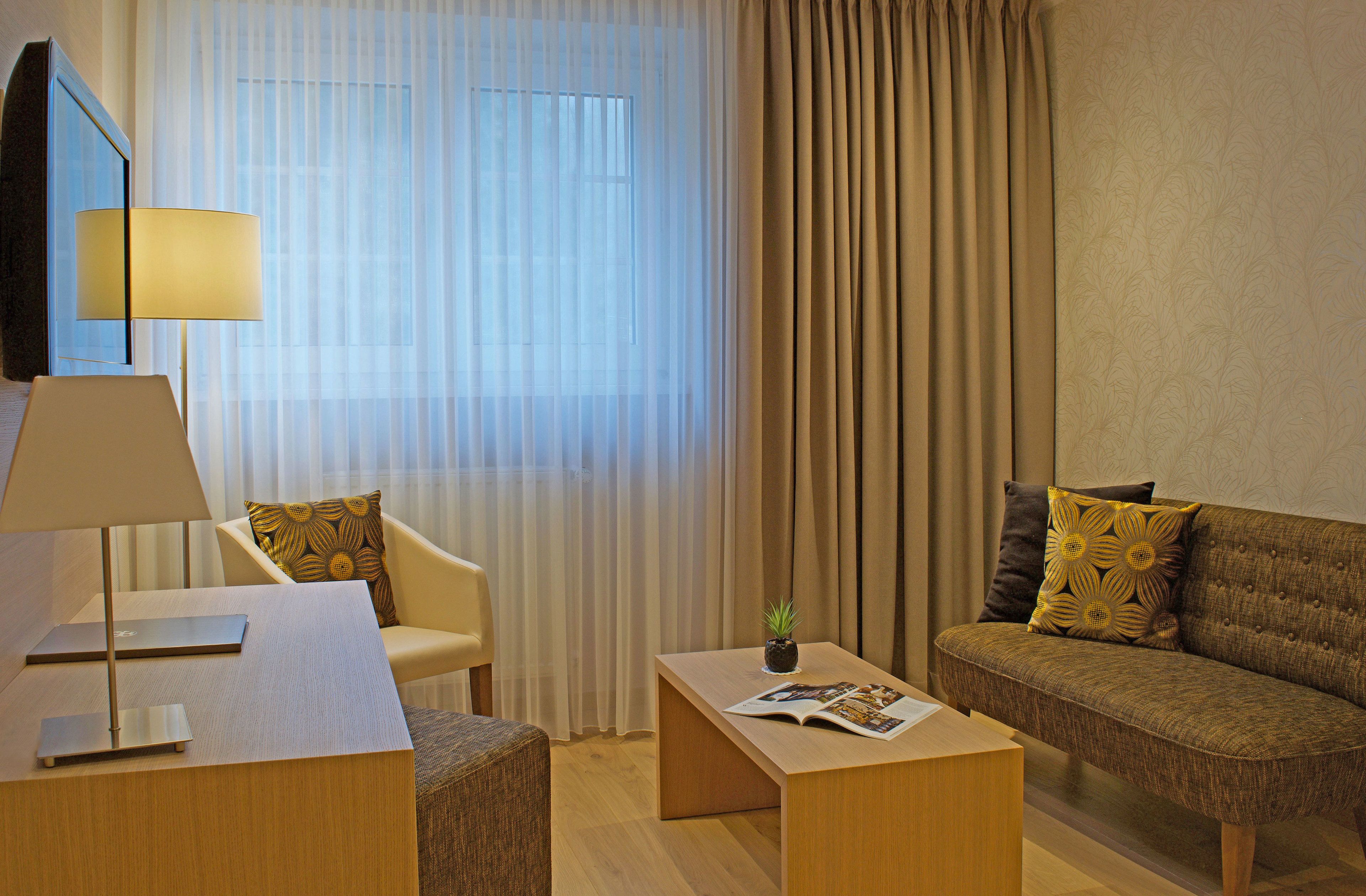 comfort double room, terrace | living area | flat-screen tv