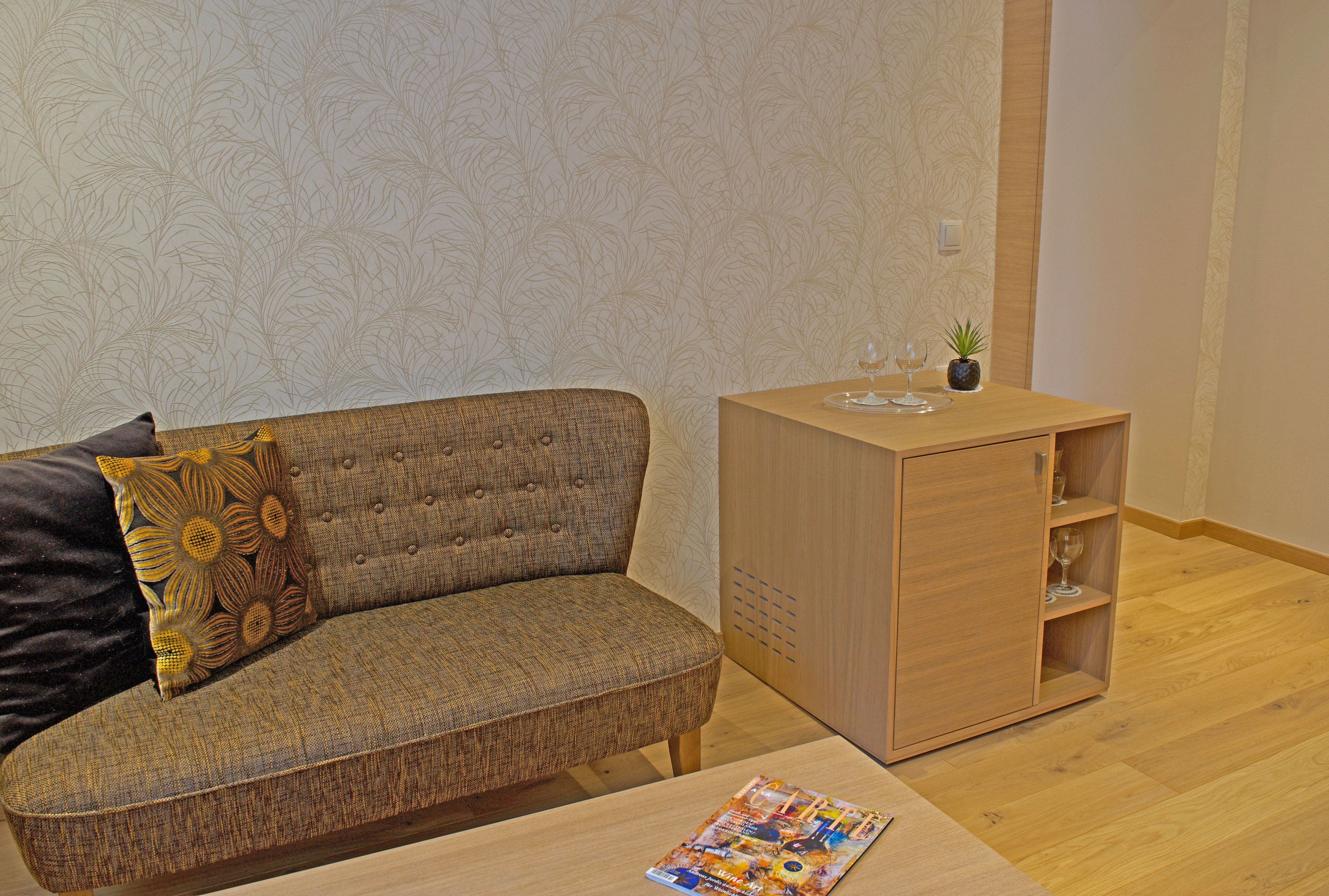 comfort double room, terrace | living area | flat-screen tv