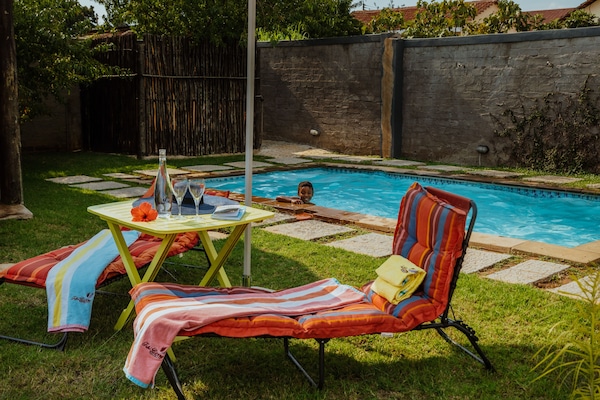 2 outdoor pools, sun loungers