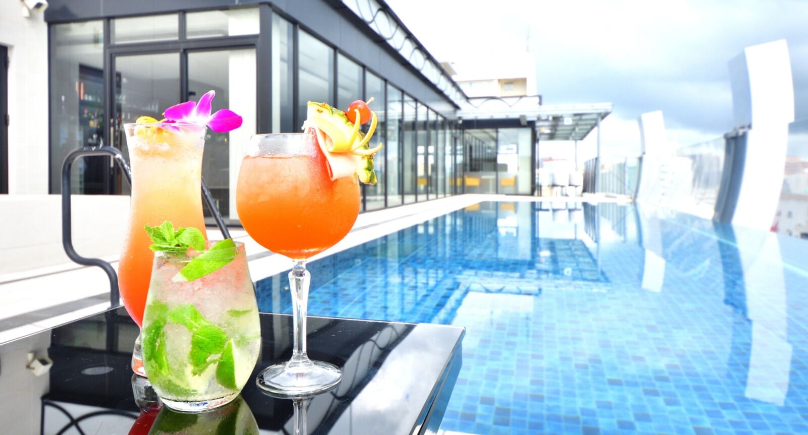 Outdoor pool, open 10:00 AM to 11:00 PM, sun loungers