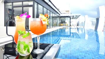 Outdoor pool, open 10:00 AM to 11:00 PM, sun loungers