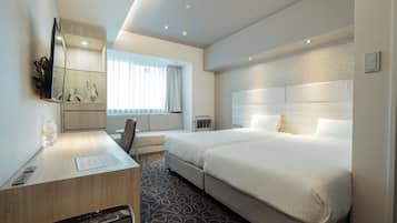 Premium bedding, down duvets, blackout curtains, iron/ironing board