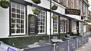 A pub named "The Royal Victoria & Bull Hotel" with outdoor seating and hanging flower baskets. - The Royal Victoria & Bull Hotel (Dartford)